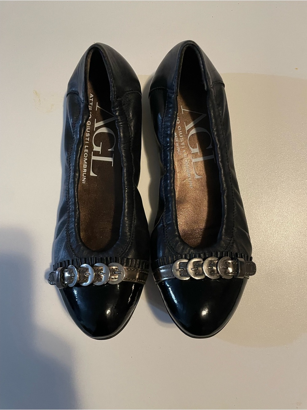 Attilio Giusti Leombruni Black Leather Flats with Silver Buckle Detail